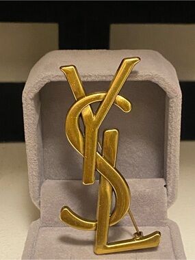 Yves Saint Laurent Gold Satin 
Tone Interlocking YSL Logo Pin
Brooch Unisex
